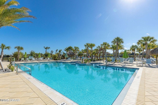 pool with a patio area