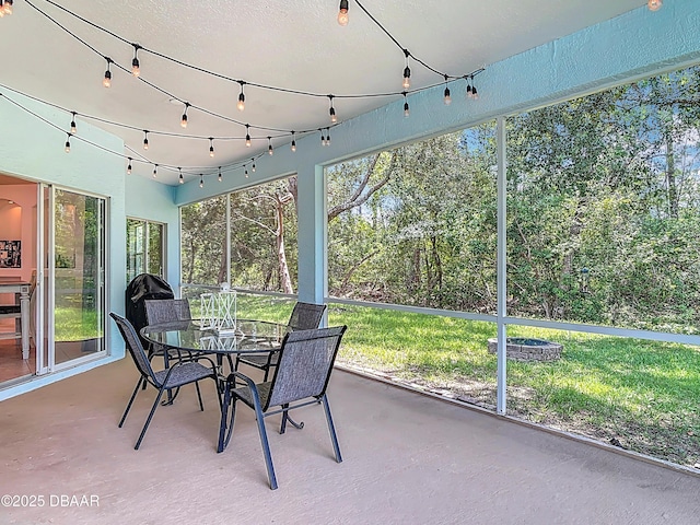 12 Kathleen Trl, Palm Coast, FL 32164 - sunroom / solarium featuring outdoor dining space