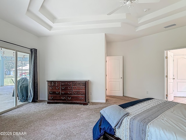12 Kathleen Trl, Palm Coast, FL 32164 - bedroom featuring a raised ceiling, carpet floors, access to exterior, a ceiling fan, and baseboards