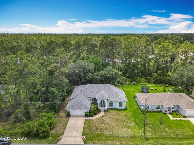 12 Kathleen Trl, Palm Coast, FL 32164 - view from above of property featuring a heavily wooded area