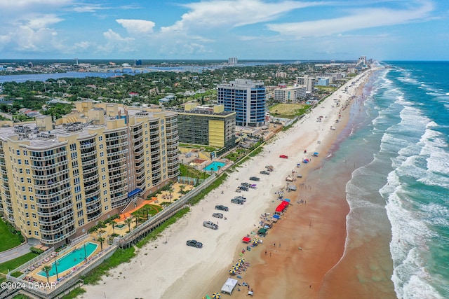 aerial view featuring a beach view and a water view