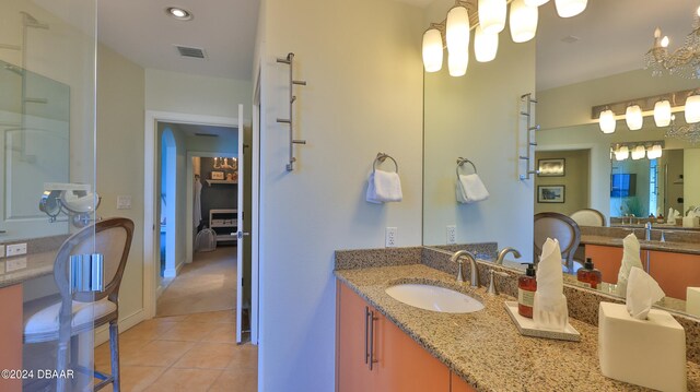 bathroom featuring vanity and tile patterned flooring