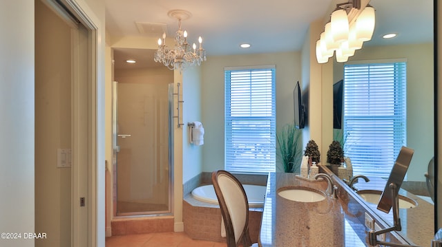 dining room with light tile patterned floors, sink, and a notable chandelier