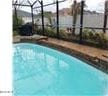 outdoor pool with a lanai