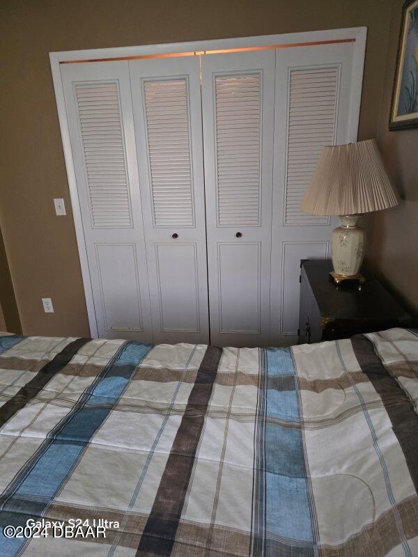 1461 Felton St, Deltona, FL 32725 - bedroom with a closet