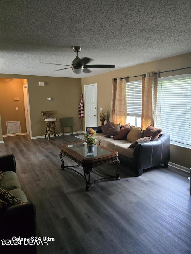 1461 Felton St, Deltona, FL 32725 - living room with a textured ceiling, baseboards, wood finished floors, and ceiling fan