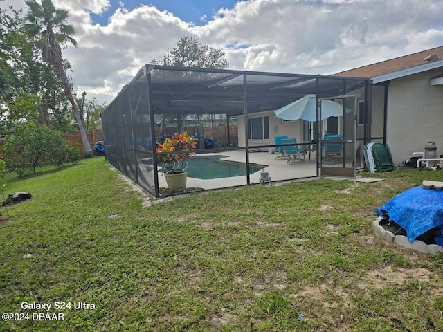 1461 Felton St, Deltona, FL 32725 - back of house featuring a patio, stucco siding, and a lanai