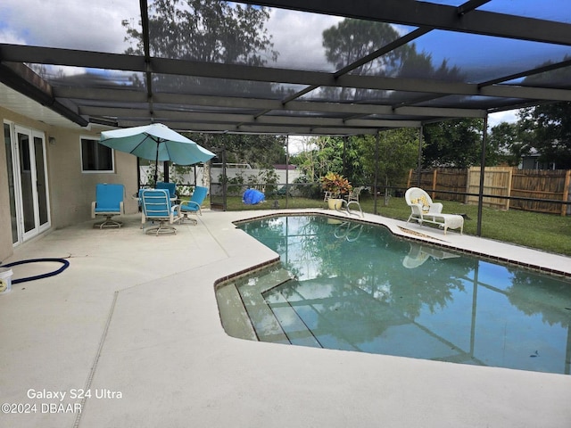 1461 Felton St, Deltona, FL 32725 - view of swimming pool with a fenced backyard, a patio area, and glass enclosure