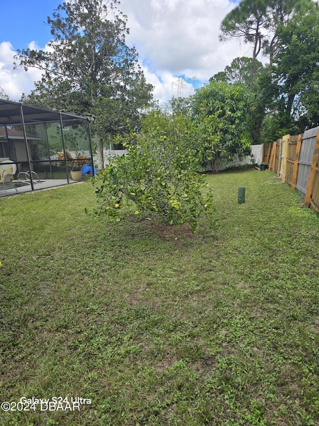 1461 Felton St, Deltona, FL 32725 - view of yard with glass enclosure