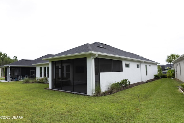 437 Aquamarine Way, Daytona Beach, FL 32124 - view of home's exterior with a sunroom and a lawn