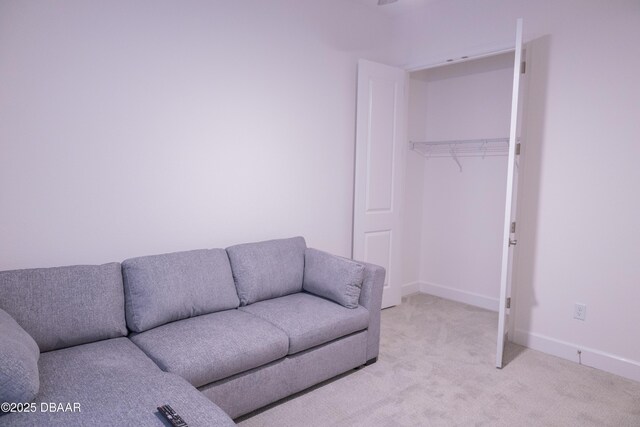 437 Aquamarine Way, Daytona Beach, FL 32124 - living room featuring light carpet and baseboards