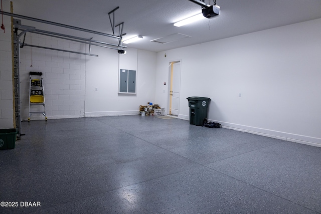 437 Aquamarine Way, Daytona Beach, FL 32124 - garage featuring a garage door opener and electric panel