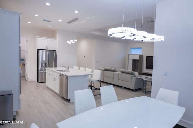 437 Aquamarine Way, Daytona Beach, FL 32124 - dining area featuring a chandelier, recessed lighting, and light wood-style floors