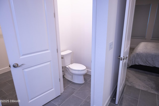 437 Aquamarine Way, Daytona Beach, FL 32124 - bathroom with tile patterned flooring and toilet