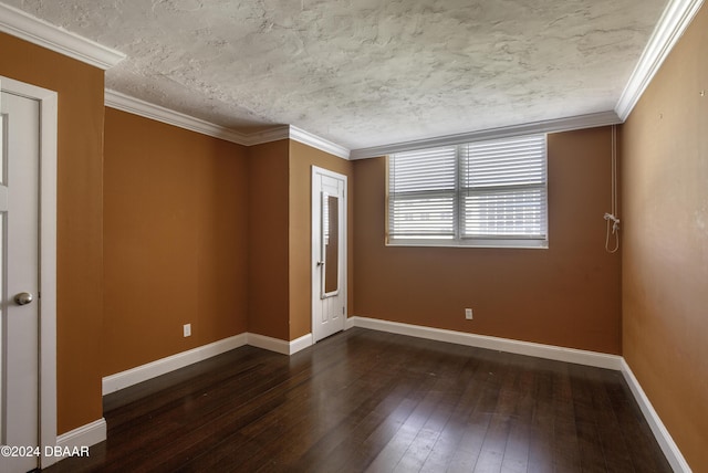 unfurnished room featuring dark hardwood / wood-style floors and ornamental molding