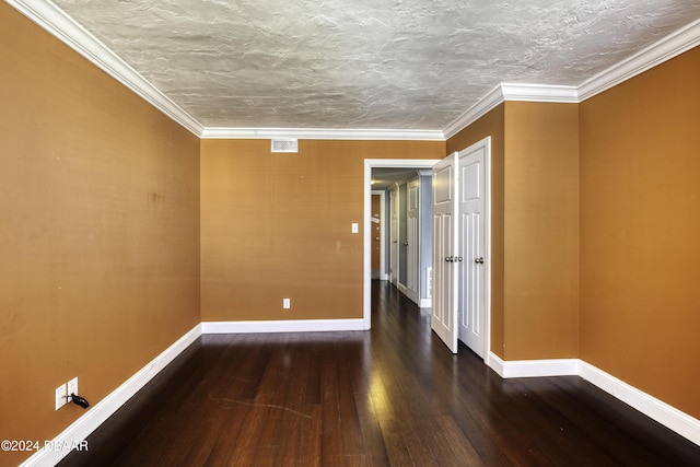 unfurnished room featuring a textured ceiling, crown molding, and dark hardwood / wood-style floors