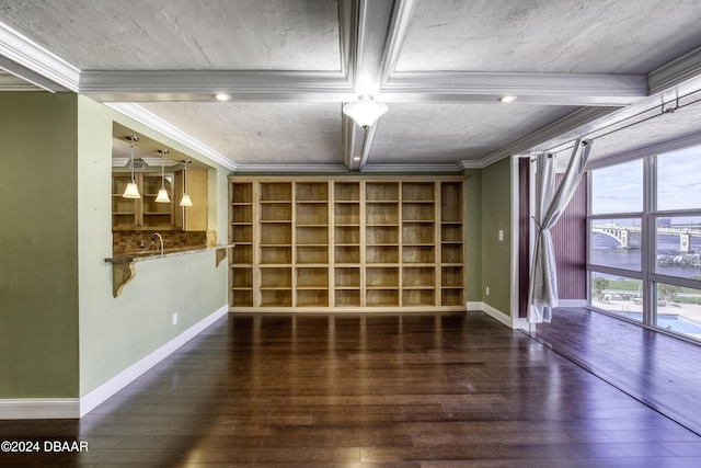 interior space with beam ceiling, a water view, ornamental molding, and dark wood-type flooring