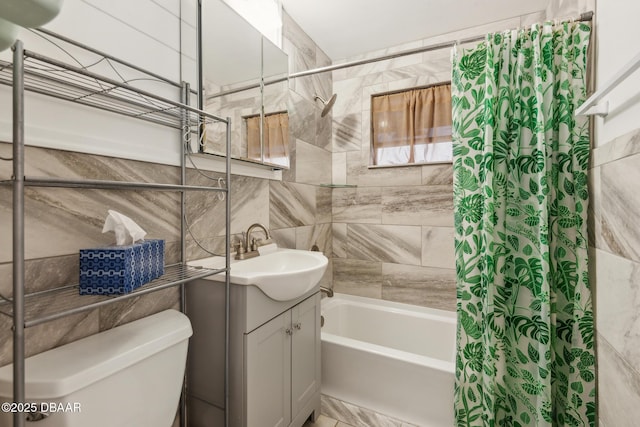 full bathroom featuring tile walls, shower / bath combination with curtain, backsplash, vanity, and toilet