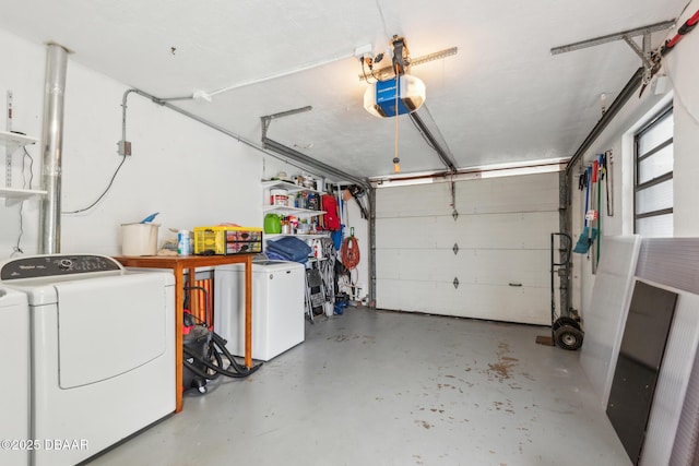 garage featuring a garage door opener, refrigerator, and independent washer and dryer