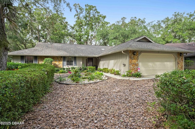 ranch-style house featuring a garage