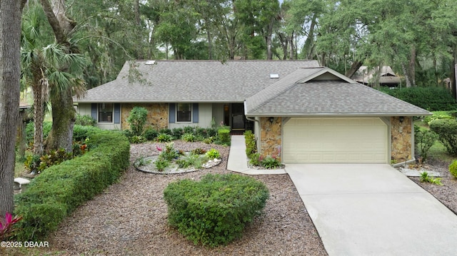 single story home featuring a garage