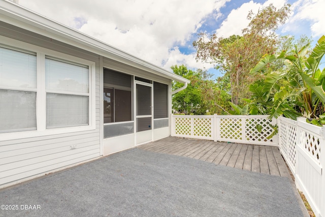 936 Meadow View Dr Unit A, Port Orange, FL 32127 - wooden deck featuring a sunroom