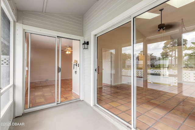 936 Meadow View Dr Unit A, Port Orange, FL 32127 - unfurnished sunroom with a ceiling fan and a skylight