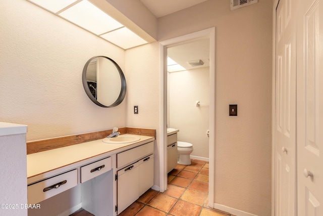 936 Meadow View Dr Unit A, Port Orange, FL 32127 - bathroom with toilet and vanity
