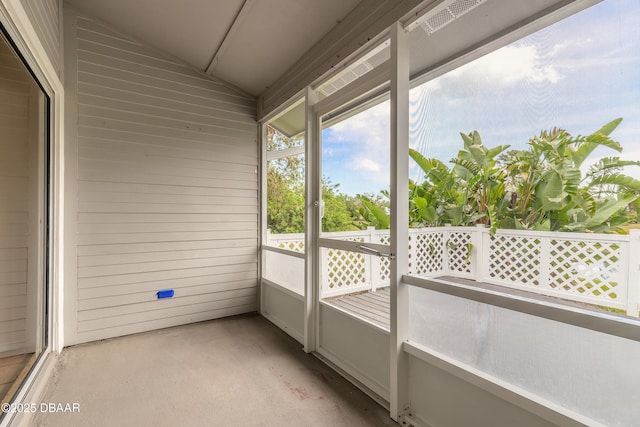 936 Meadow View Dr Unit A, Port Orange, FL 32127 - unfurnished sunroom featuring lofted ceiling