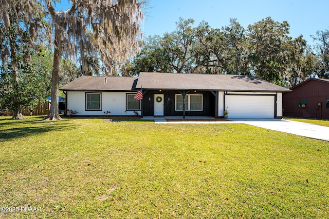 ranch-style house featuring a garage, a front yard, concrete driveway, and fence