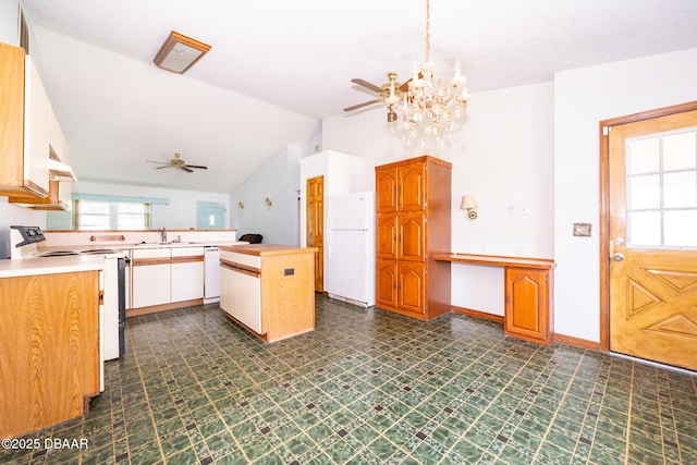 355 Palm Cir, Flagler Beach, FL 32136 - kitchen with white appliances, ceiling fan, lofted ceiling, dark flooring, and a chandelier