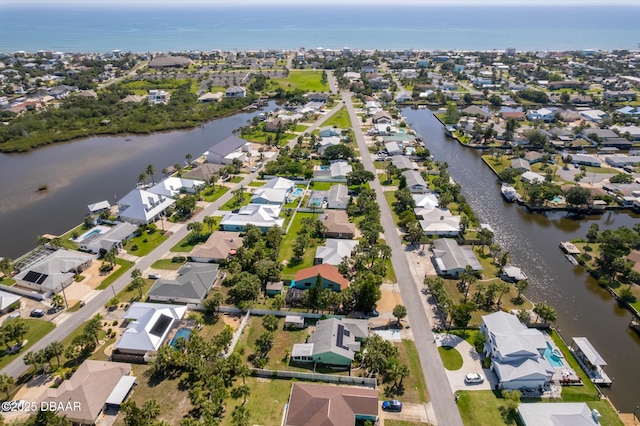 355 Palm Cir, Flagler Beach, FL 32136 - aerial view of property and surrounding area featuring nearby suburban area and a large body of water