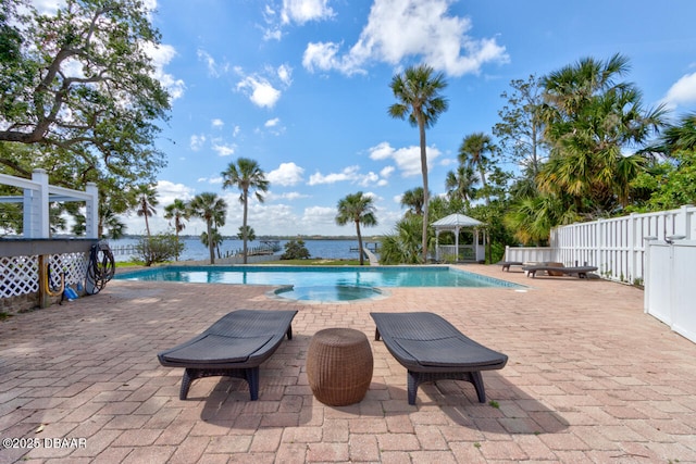 view of swimming pool featuring a gazebo and a patio area