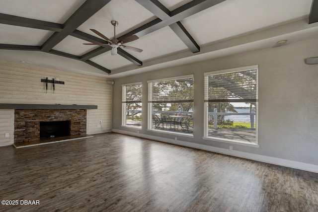 unfurnished living room featuring a fireplace, wood-type flooring, a healthy amount of sunlight, and ceiling fan