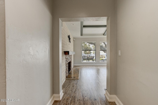 hall with wood-type flooring