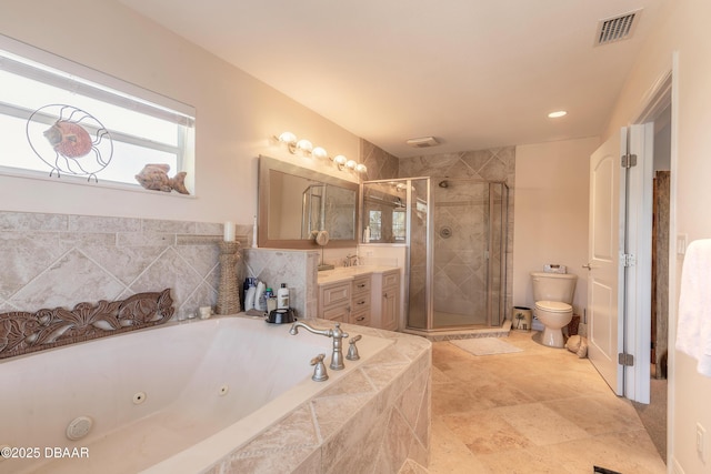 full bathroom featuring separate shower and tub, vanity, and toilet