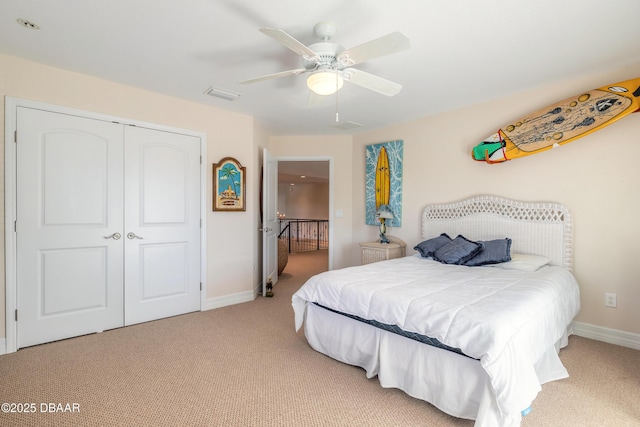 bedroom with carpet, a closet, and ceiling fan