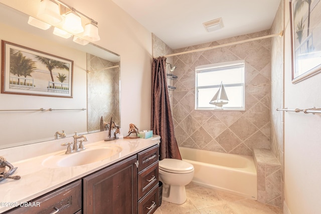 full bathroom with vanity, toilet, and shower / bath combo