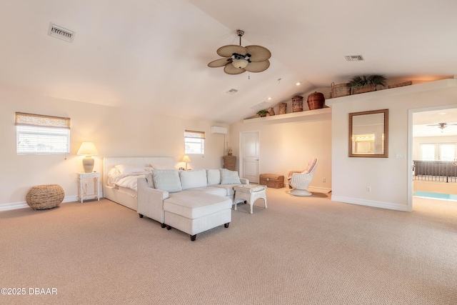 living room with ceiling fan, plenty of natural light, and light carpet