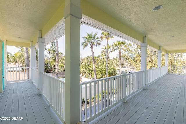 wooden deck featuring covered porch