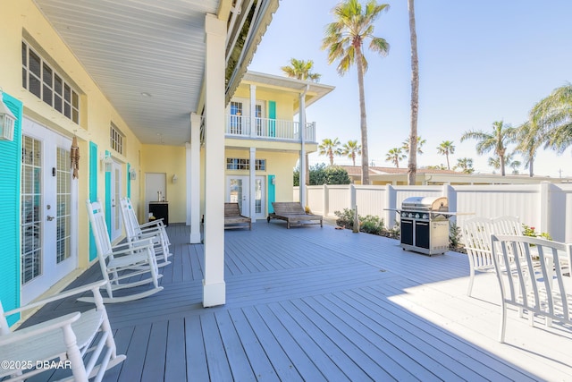 wooden terrace with grilling area