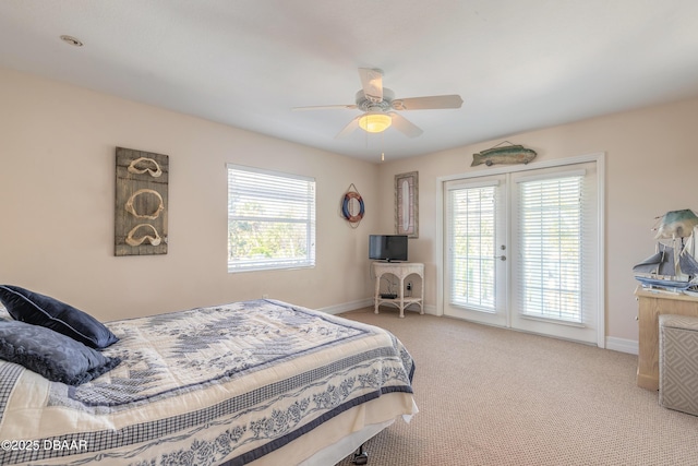 bedroom with ceiling fan, access to exterior, and light carpet