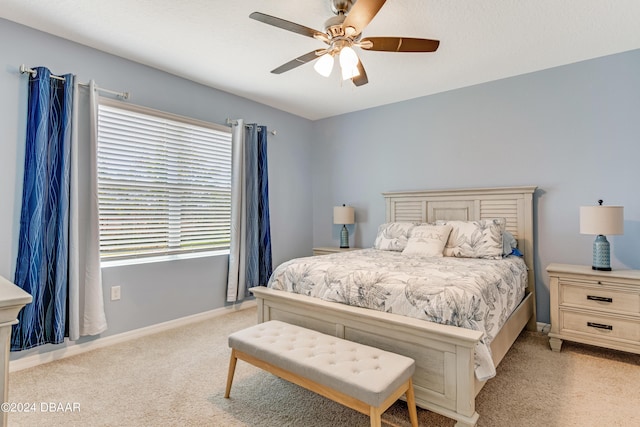 1362 Cork Dr, Ormond Beach, FL 32174 - bedroom with light colored carpet, baseboards, and ceiling fan
