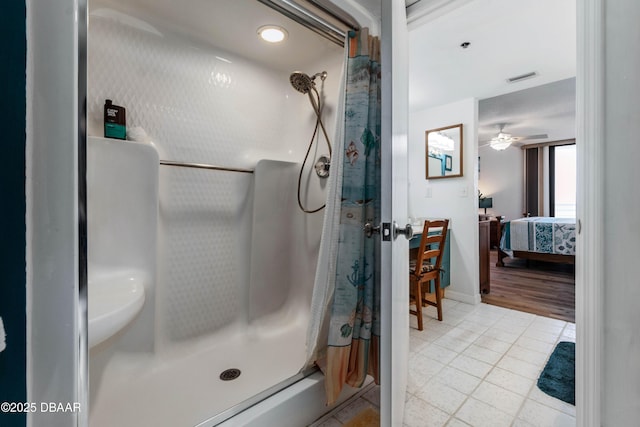 ensuite bathroom featuring visible vents, baseboards, tile patterned floors, ensuite bathroom, and curtained shower