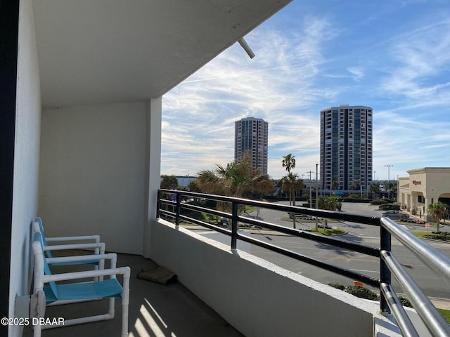 balcony featuring a city view