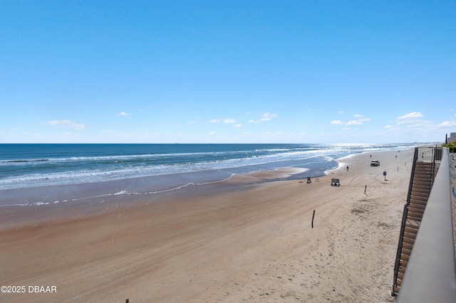 property view of water featuring a beach view