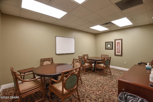 dining room featuring a paneled ceiling