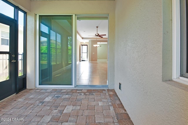 exterior space with plenty of natural light and ceiling fan