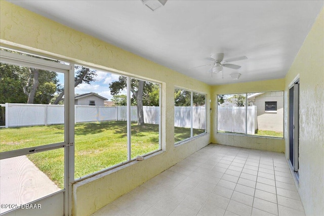 744 Hawks Ridge Rd, Port Orange, FL 32127 - unfurnished sunroom featuring ceiling fan