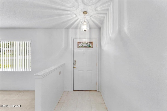 744 Hawks Ridge Rd, Port Orange, FL 32127 - doorway to outside featuring baseboards and light tile patterned floors